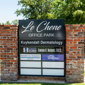 Signboard displaying the name 'Kuykendall Dermatology in Edmond, OK